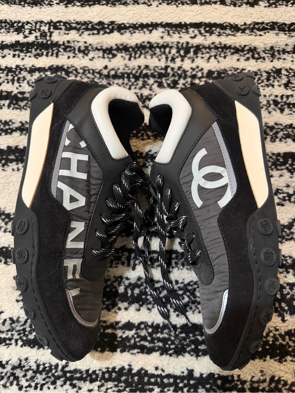CHANEL Black and White Logo Runner Sneakers